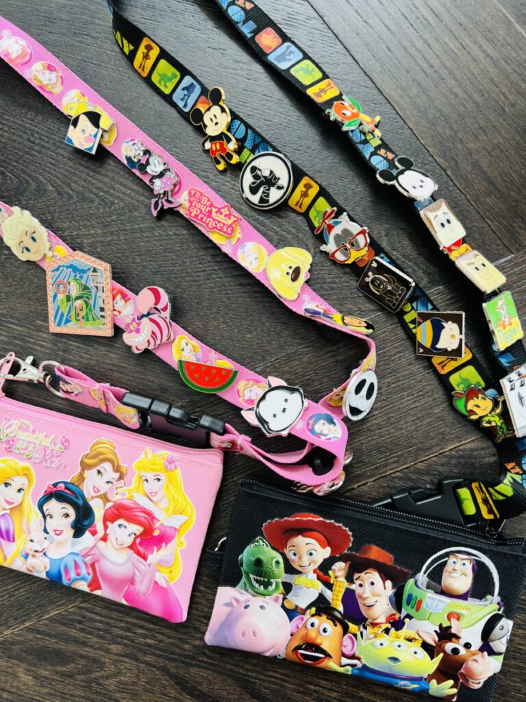 Disney lanyards with an assortment of Disney trading pins